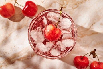 refreshing lemonade with ice and cherries