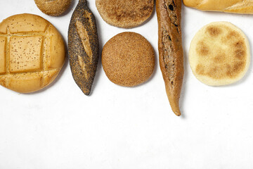Background of assorted breads from above. Bakery food. Healthy food concept. flat lay
