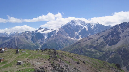 Top view of Observatory on background of mountains in summer. Clip. Research station located in...