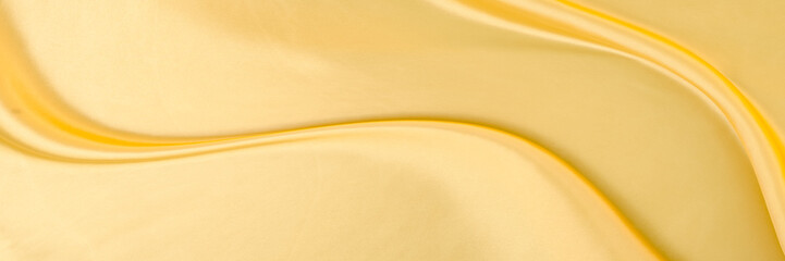 Fototapeta premium White yellow satin texture that is gray silver fabric silk background with beautiful soft blur pattern natural.