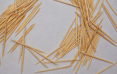 Fototapeta na wymiar wooden toothpicks on a white background