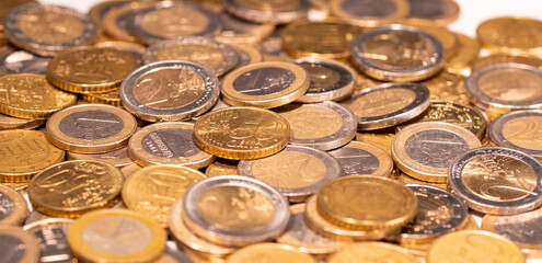 Heap of euro coins. Focus on the fifty cent coin. European currency.