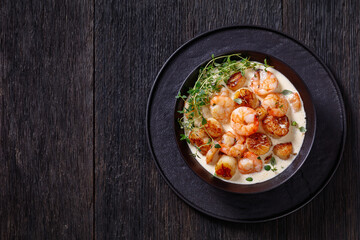 shrimps and scallops in spicy coconut cream sauce