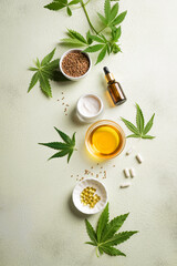 Fototapeta na wymiar Hemp cannabis leaves, oil and products