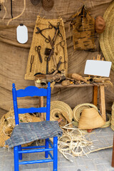 Nice blue chair in a traditional wicker artisan workshop