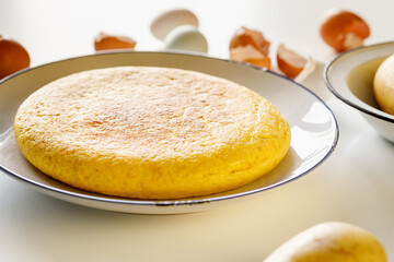  Close up of Spanish omelette made of eggs and potatoes. Tortilla espanola.