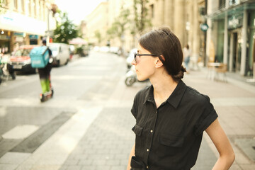 business woman walking in the street 