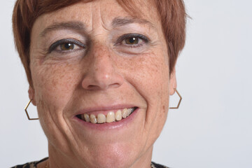 close up of a  middle aged woman on white background