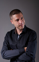 A young man in a black shirt