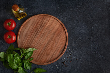 Black background with wooden pizza board