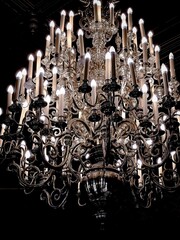 vintage large crystal chandelier with pendants at night