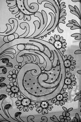 detail of a lace curtain in a window