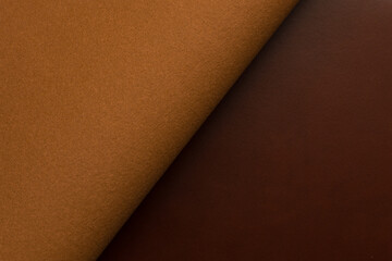 brown artificial leather with waves and folds on PVC base