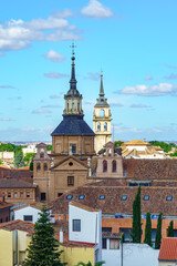 Fototapeta na wymiar Old buildings and church towers of the monumental city of Alcala de Henares in Madrid.
