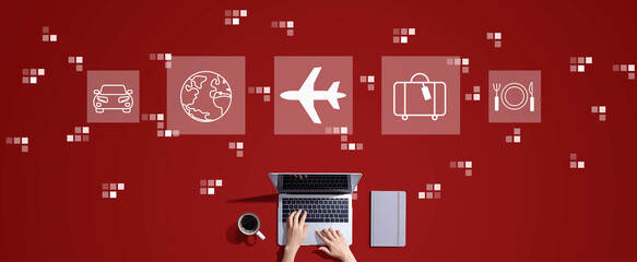 Airplane travel theme with person working with a laptop