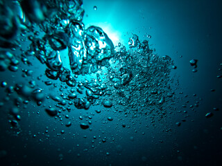 Fototapeta na wymiar Bubbles in blue water