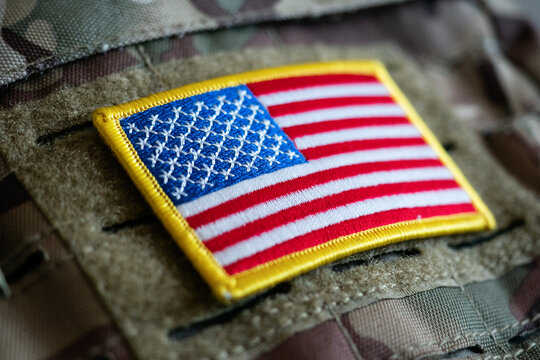 Close-up of USA flag on military equipment