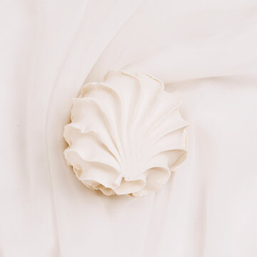 Vanilla marshmallow close-up, flat lay. Pastel background