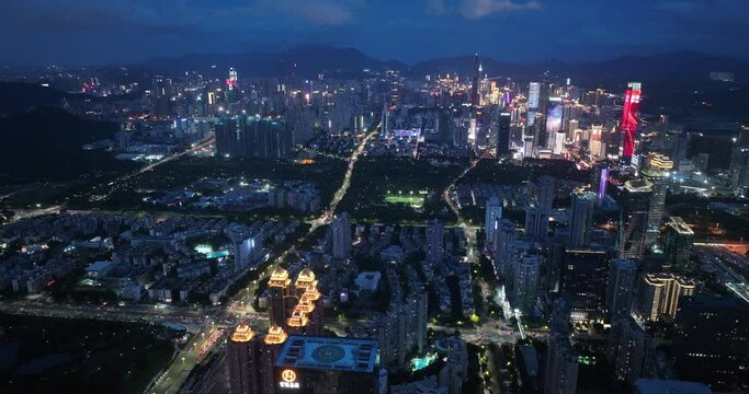 Aerial footage of night cityscape in shenzhen city, China