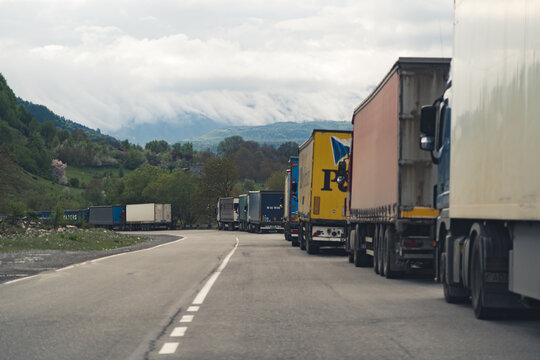 16.05.2022. Dariali Gorge, Georgia. trucks waiting to pass the border between Georgia and Russia. High quality photo