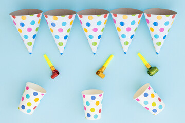Birthday party hats on blue background