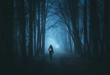 Mysterious road. Fairy Mysterious Forest. Mystical atmosphere. Paranormal another world. Stranger forest in a fog. Dark wood. Background wallpaper. Scary forest trees in a fog. Horrible dream.