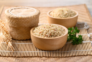 Thai brown rice grain in bowl, Organic rice, Healthy food ingredients
