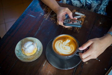 closeup hand drinking hot coffee, relax time 
