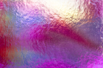 Mermaid pink, red and purple colorful metallic holographic iridescent shiny foil texture background
