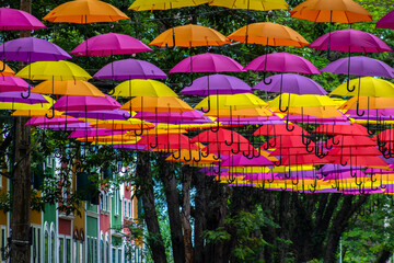 Holambra, Sao Paulo, Brazil. March 16, 2022. tourist spot in the city of Holambra, alameda decorated with colorful umbrellas, dutch clogs and typical building.