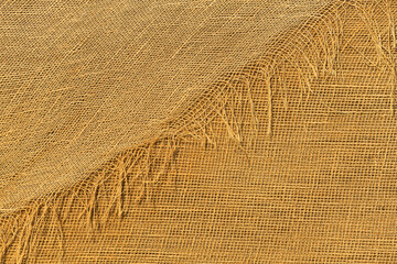Detail view of the abstract texture of a raffia bag great for backgrounds