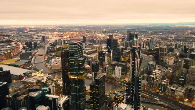Aerial drone view of Melbourne City, Victoria, Australia looking over Yarra River in the early morning 