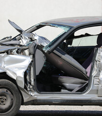 completely destroyed car with shattered glass after the traffic accident