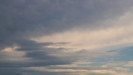 Unusual dark pink layered stratus clouds, skyscape.