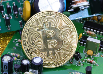 coins with the symbol B in capital letters symbolizing the cryptocurrency called BITCOIN above the...