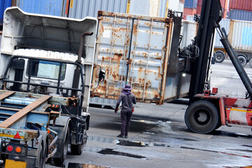 Cargo trucks in container yard