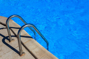 Swimming pool with clear water at a tropical resort