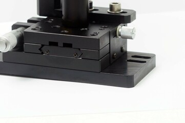 A stage for adjust of a prism mirror mount of the laser beam light.