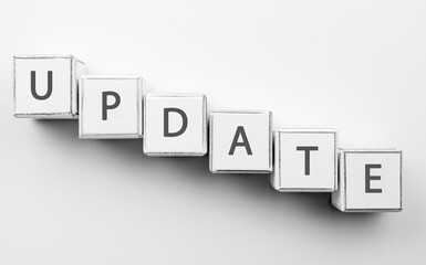 Obraz premium Word UPDATE made of cubes on white background