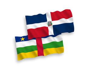 National vector fabric wave flags of Dominican Republic and Central African Republic isolated on white background. 1 to 2 proportion.