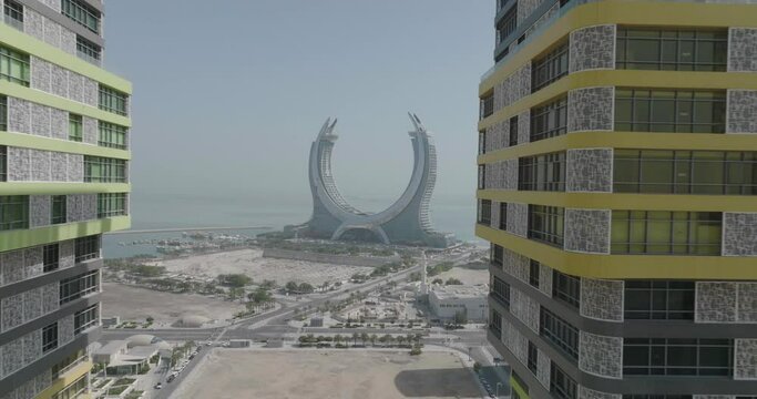 Push in Drone shot over Lusail city twords Katara Hotel in Doha, Qatar.