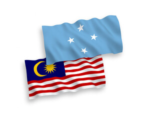 National vector fabric wave flags of Federated States of Micronesia and Malaysia isolated on white background. 1 to 2 proportion.