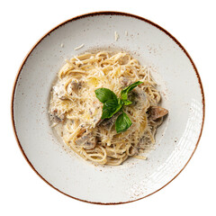Isolated portion of mushroom spaghetti pasta on white background