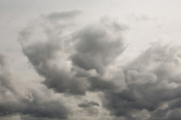 Stormy cumulus clouds on the sky, atmosphere background