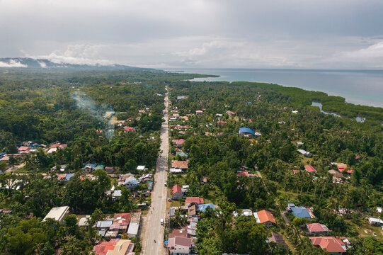 The Bohol circumferential highway passing through the town of Alburquerque.