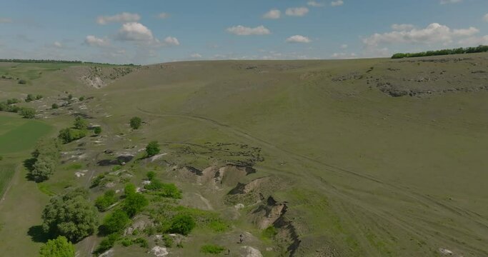 aerial shot of trinca canyon with flock of sheep