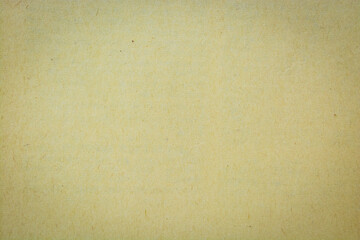Brown recycled craft paper texture as background. Cream paper texture, Old vintage page or grunge vignette. Pattern rough art creased grunge letter. Hardboard with copy space for text.