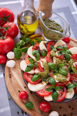 Caprese salad - sliced mozzarella cheese and tomatoes