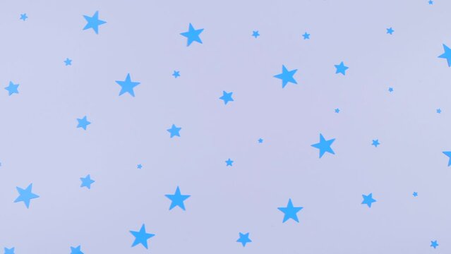 Rotating white background with blue stars, birthday or party concept.Children purple background