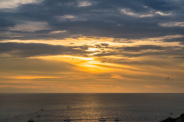 The sun is falling in sunset time at Promthep Cape in Phuket, Thailand.